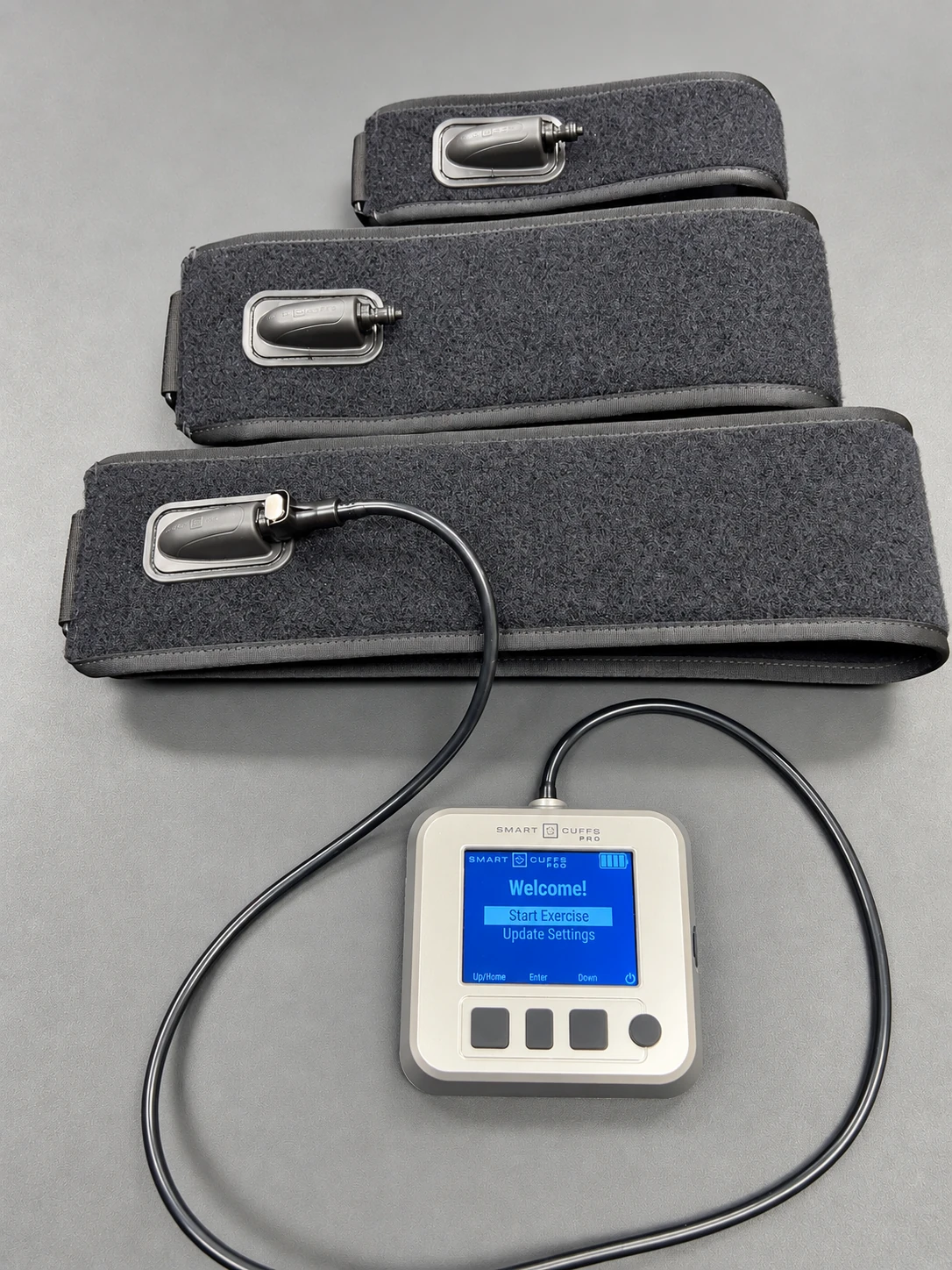 Smart Cuffs Pro blood flow restriction cuffs and controller at MILO