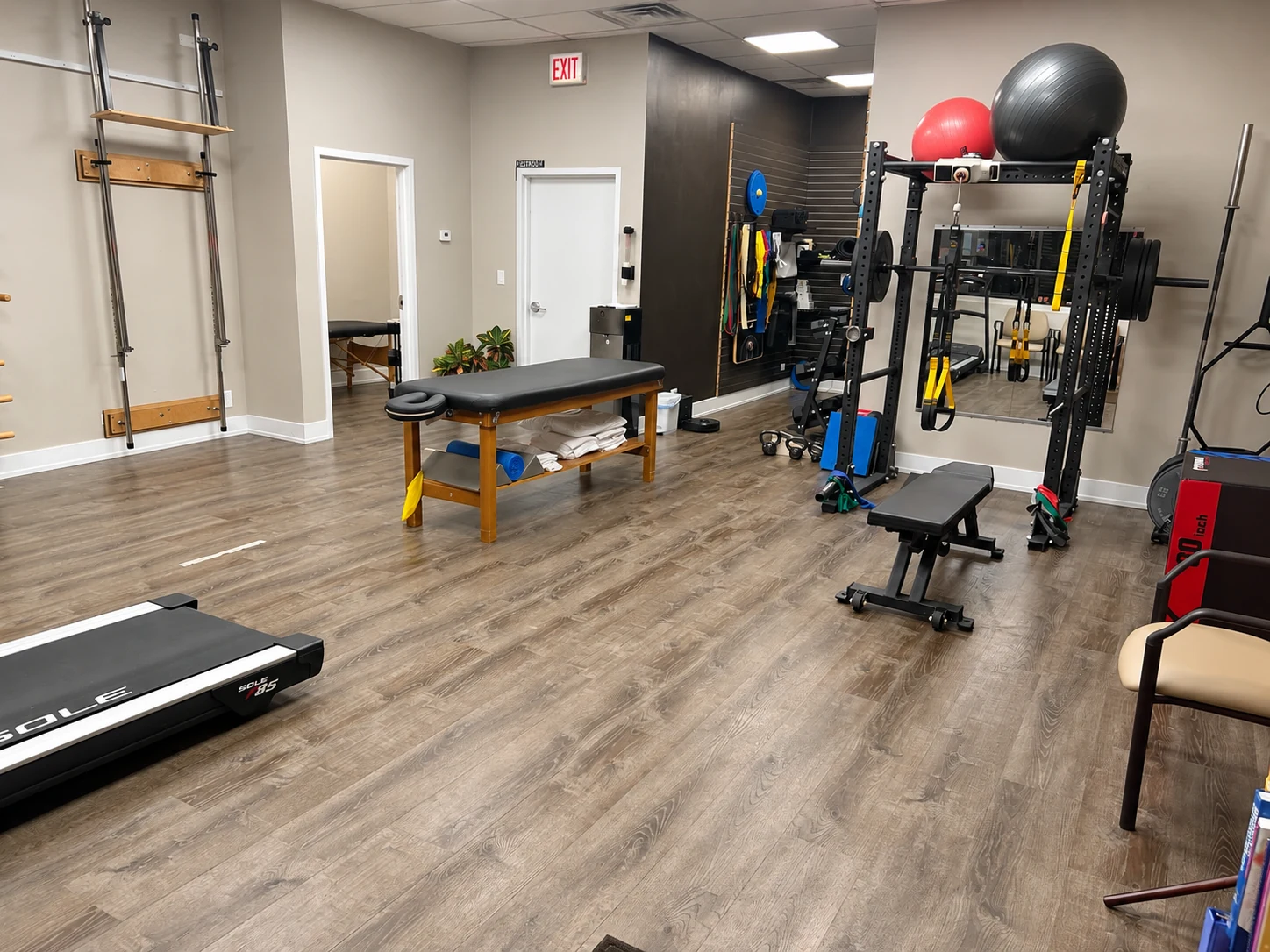 Treatment table and strength equipment inside MILO